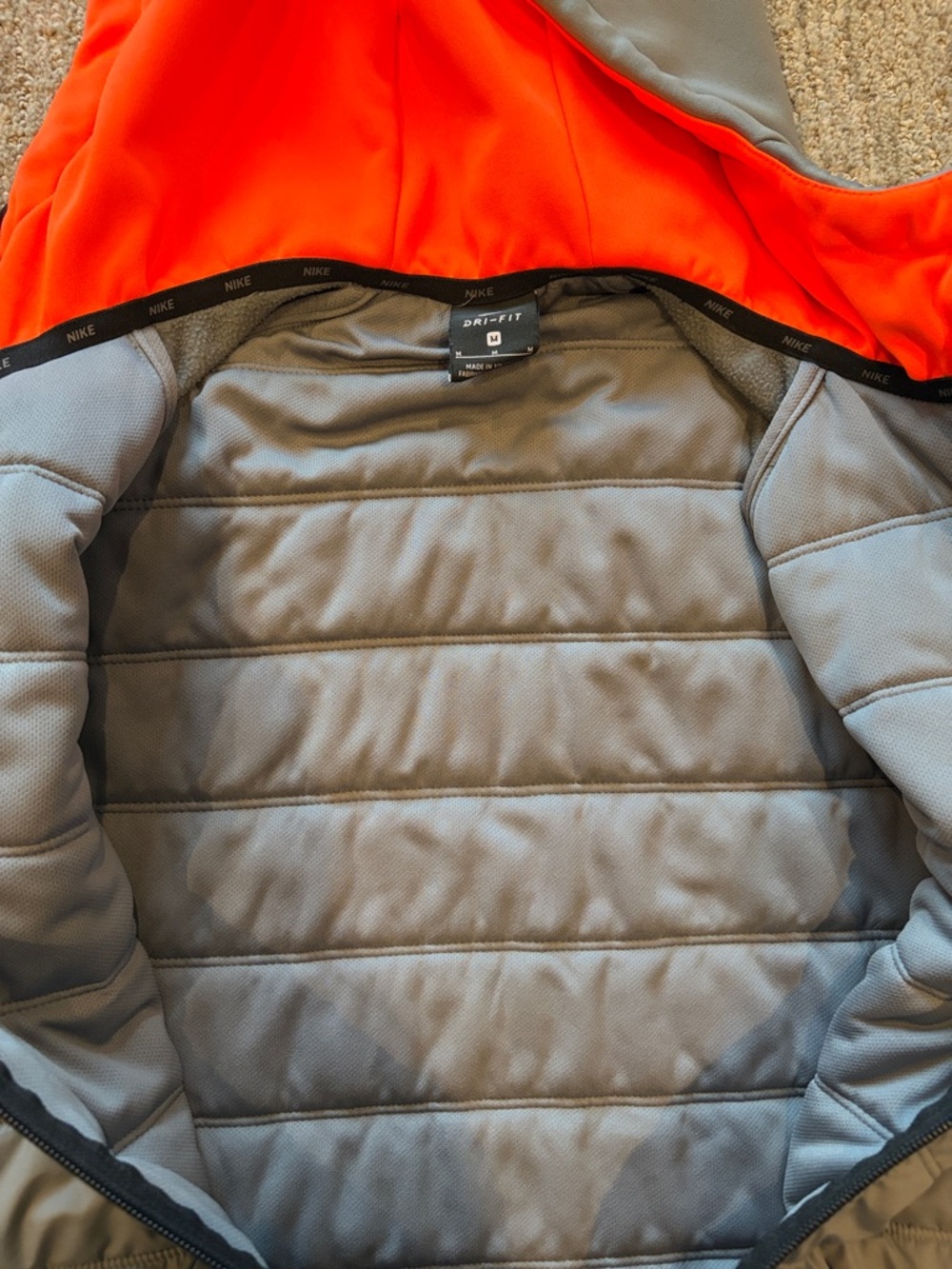 Nike Men’s Gray Sleeveless Puffer Vest with Orange Lining Hood - Picture 4 of 4